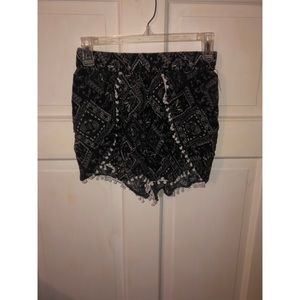 Black and white shorts w/ tiny balls on the bottom